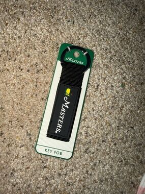 Masters Black Key Strap with Green Tag and Yellow Bell